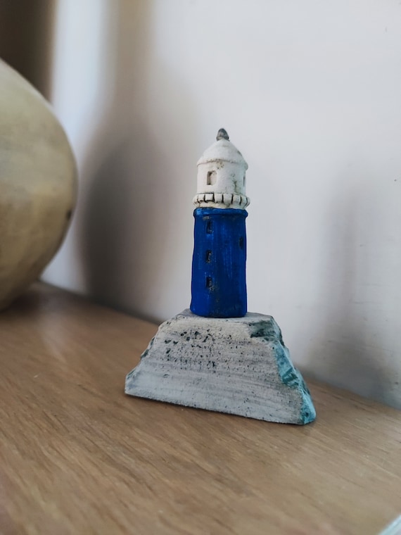 Blue lighthouse miniature, ceramic lighthouse figure of stoneware clay, blue white, tiny lighthouse