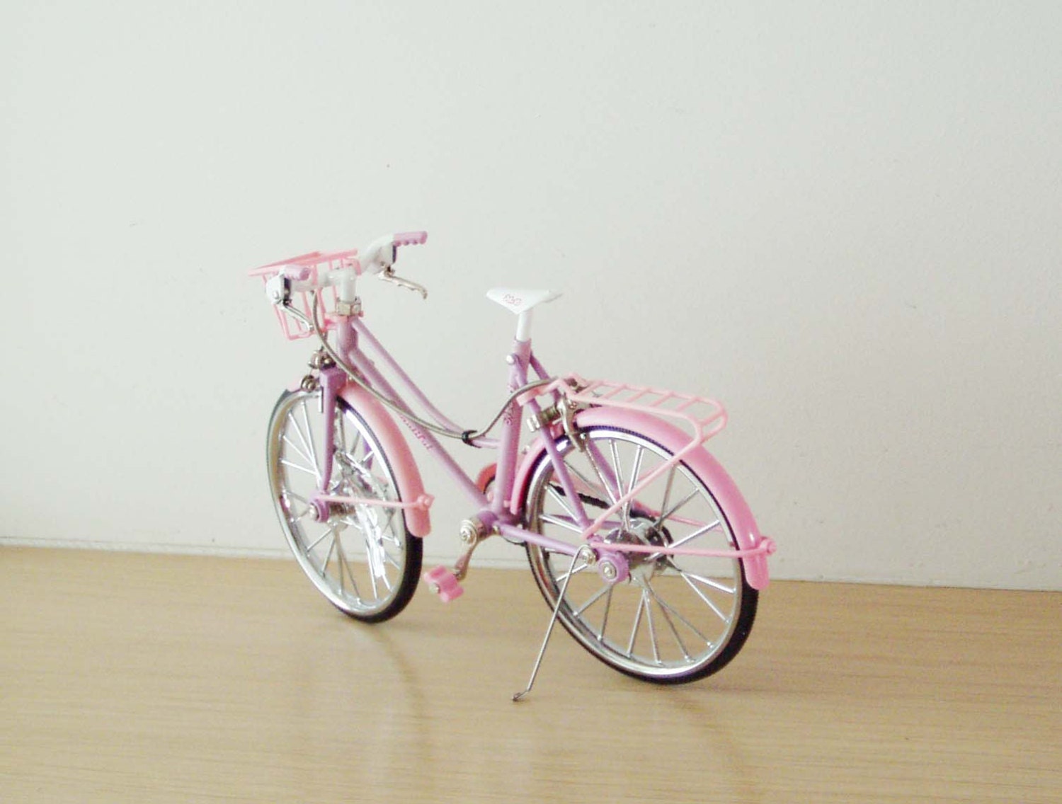 pink bicycle with basket