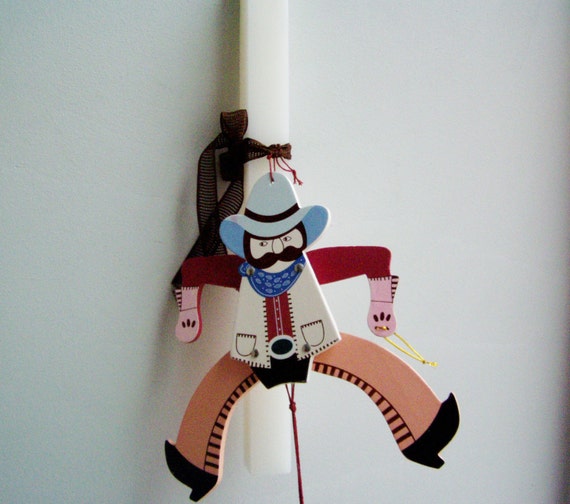 Cowboy Easter candle, cowboy wooden marionette on white Easter candle, boys, Greek Easter candle, colorful, cowboy puppet with moving parts