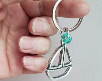 Boat keyring, alloy sailboat keyring with turquoise blue bead, nautical key chain of silver plated sailboat figure