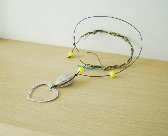 Metal heart necklace, long boho necklace of silver plated, alloy heart on black cord with colourful, braided side and yellow, glass beads,