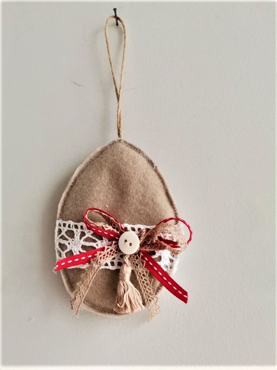 Beige Easter egg, decorative Easter egg ornament, beige brown, felt egg plushie with ribbon, bow and tassel