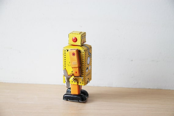 Vintage robot toy, tin robot wind up toy in yellow, collectible, walking robot toy, Chinese, robot clockwork toy, late eighties