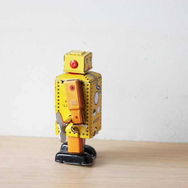 Vintage robot toy, tin robot wind up toy in yellow, collectible, walking robot toy, Chinese, robot clockwork toy, late eighties