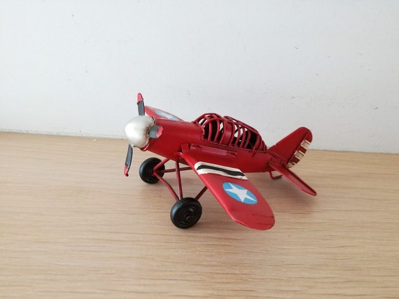 red airplane toy