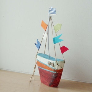 Ceramic sailing boat with colourful flags, stoneware clay boat outline sculpture with wire mast and fabric flags image 2