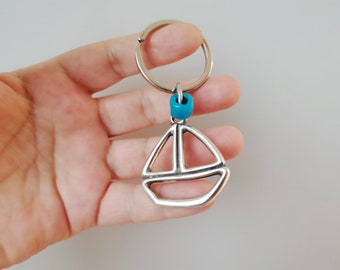 Sailboat keyring, alloy sailboat keychain with blue bead, nautical key chain of silver plated sailboat outline
