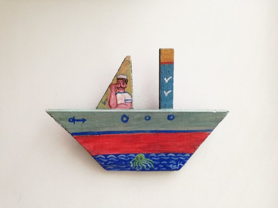 Sailor on wooden boat, folk art shabby boat of reclaimed wood, salvaged, old wood folk boat with Greek sailor painted, Greek folk art