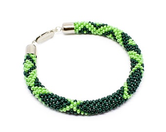 Green beaded rope bracelet 7 inch. Geometric Nepal style hand crafted bangle for best friend gifts.
