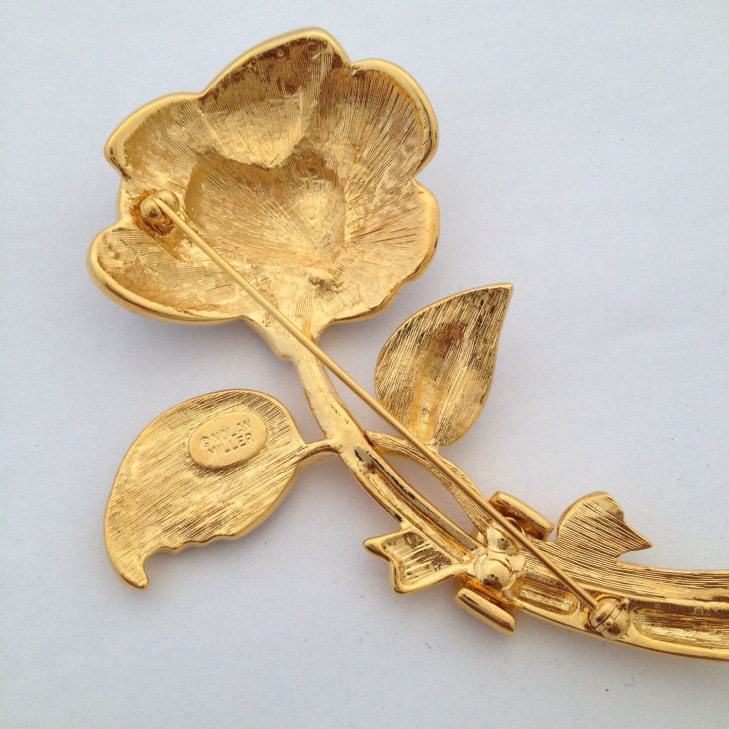 nolan miller rose brooch