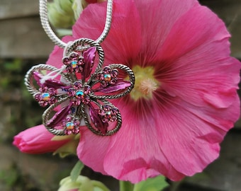 Necklace with pink flower pendant