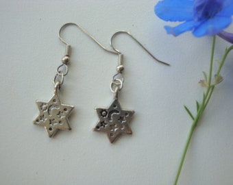 Silver tone star earrings