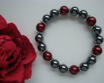 Hematite and red glass beads bracelet