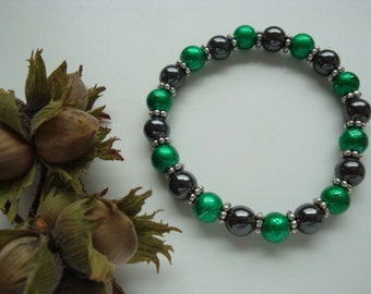 Green and black beaded bracelet.