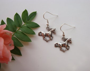 Silver tone horse charms earrings