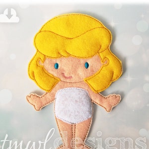 May include: A felt doll with blonde hair, blue eyes, and a white dress. The doll is a craft project and is part of a set of felt dolls.