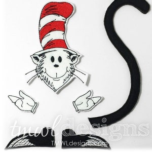 May include: A set of five felt appliques for a Cat in the Hat costume. The set includes a red and white striped hat, a white cat face with a black mustache, two white gloves, and a black tail.