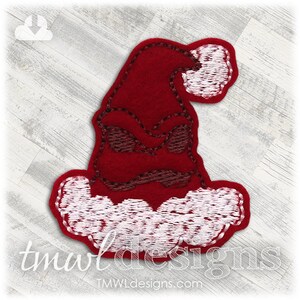 May include: Red and white felt Christmas hat with a pointy top and a white fur trim. The hat has a frowning face with a stitched-on expression.