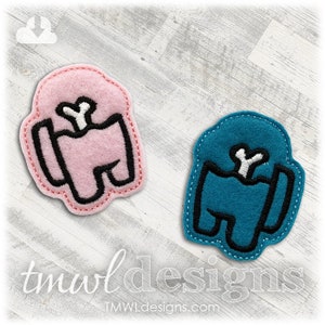 May include: Two felt patches shaped like the character from the video game Among Us. One patch is pink and the other is blue. Both patches have a white bone in the center.