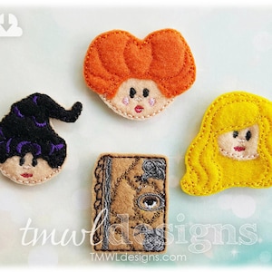 Pode incluir: Quatro designs de personagens de feltro do filme Hocus Pocus. Os personagens incluem uma bruxa com cabelo laranja, uma bruxa com cabelo loiro, uma bruxa com cabelo preto e um livro. O texto "tmwldesigns" é visível.