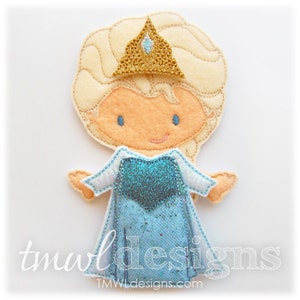 May include: A felt finger puppet of a girl with blonde hair wearing a blue dress and a gold crown with a blue jewel. The puppet is made for children's play.