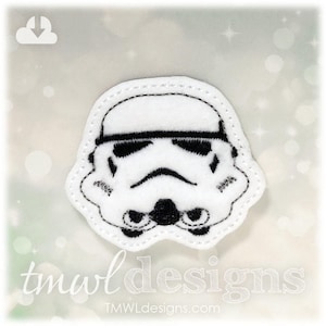 May include: White felt applique of a Star Wars Stormtrooper helmet. The helmet is black and white with a black visor.