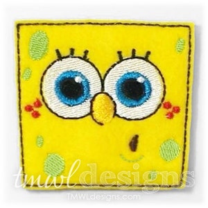 May include: A yellow square with a cartoon face. The face has large blue eyes, a small yellow nose, and a brown smile. The square has green and red spots.