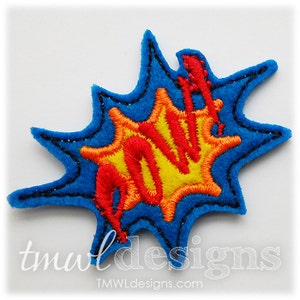 May include: A blue, yellow, and red embroidered patch with a comic book style "POW!" sound effect.