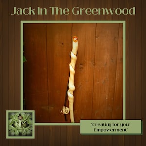 Hiking staff in Hazel wood with natural vine twist and set with Amber.