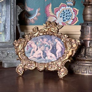 Vintage Cherub Tabletop Display: Gold Rococo Frame, Art Nouveau Style; 9.5” x 11”