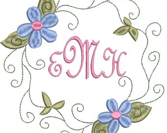 Diseño de bordado con marco de monograma floral