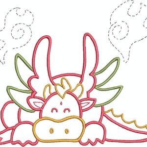 May include: A whimsical embroidery design of a cartoon dragon in shades of red, yellow, and green. The dragon has large, curved horns and wings, with a smiling face. Two dotted cloud shapes are above the dragon.