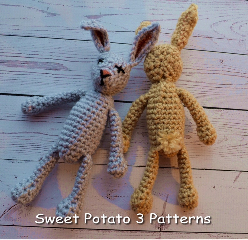 May include: Two crocheted bunny toys, one light blue and one tan, on a white wooden background. The text "Sweet Potato 3 Patterns" is at the bottom of the image.