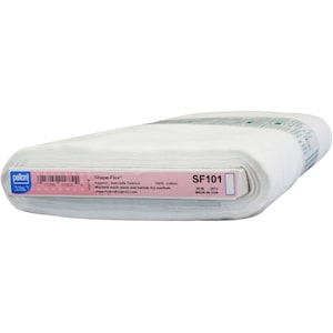May include: White cotton fabric roll labeled "Shape-Flex" Apparel-Specialty Fabrics, 100% cotton, Machine wash warm and tumble dry medium, www.PellonProjects.com, SF101, 20 IN, 2012, MADE IN USA.