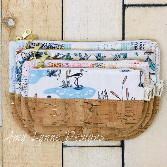 1 Set of Quintessential Quad Pouches, 4 Pouches, 4 Nesting Pouches
