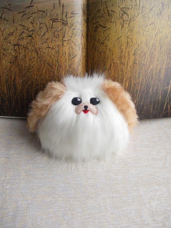 fluffy dog stuffed animal