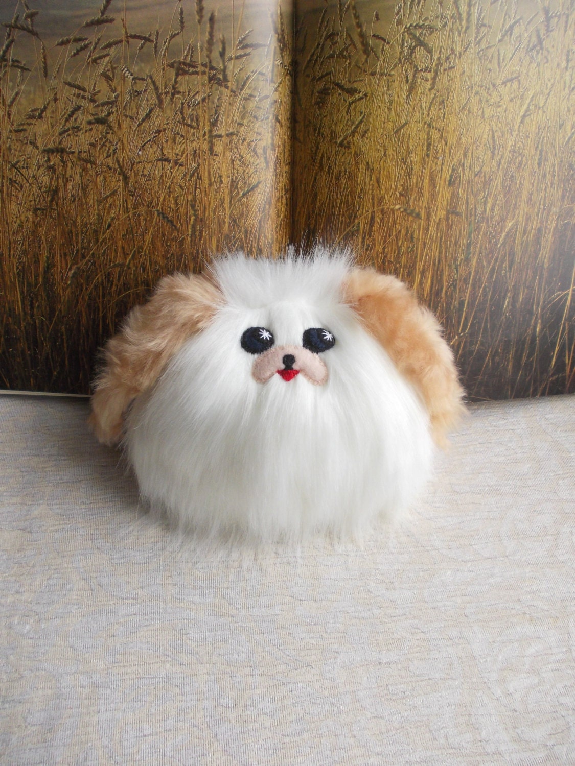 white fluffy stuffed dog