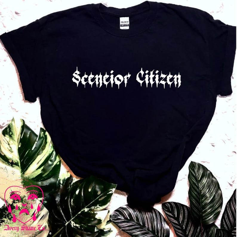 May include: Black t-shirt with the text "Senior Citizen" in white gothic lettering.