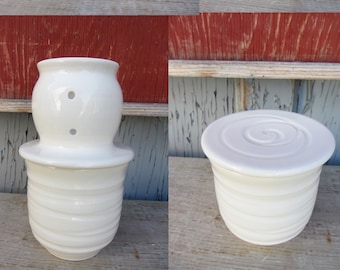 the French butter dish with a white glaze and spiralled texture