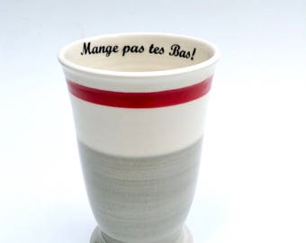 Beer or coffee mugs,wool socks pattern, Typical Quebec expression " Mange pas tes bas! " which means " stay calm! "