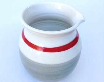 Handmade wheel-thrown creamer. Ceramic picher for cream and milk. Vintage Pottery Cream Pitcher