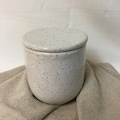 French butter dish made of stoneware with a speckled white glaze