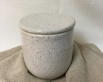 French butter dish made of stoneware with a speckled white glaze