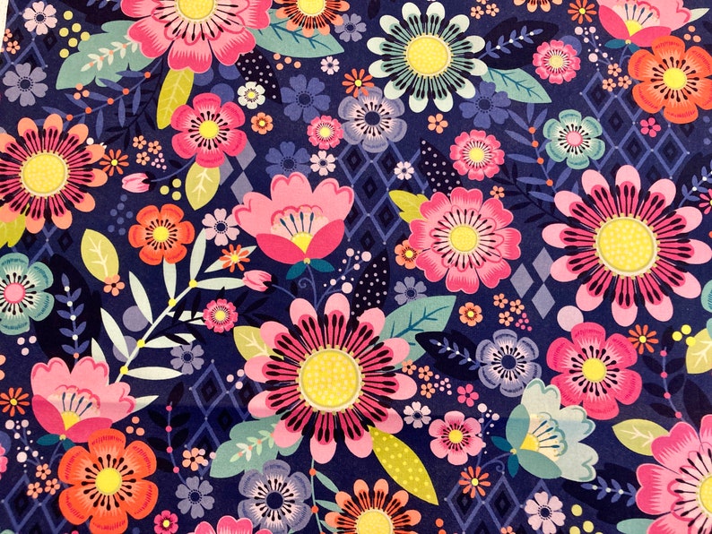May include: A navy blue background with a repeating pattern of pink, yellow, and orange flowers. The flowers are stylised and have a whimsical feel.