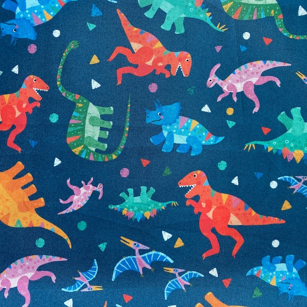 Blue dinosaur fabric, Dino Dance Party, by Michael Miller, available in two colours