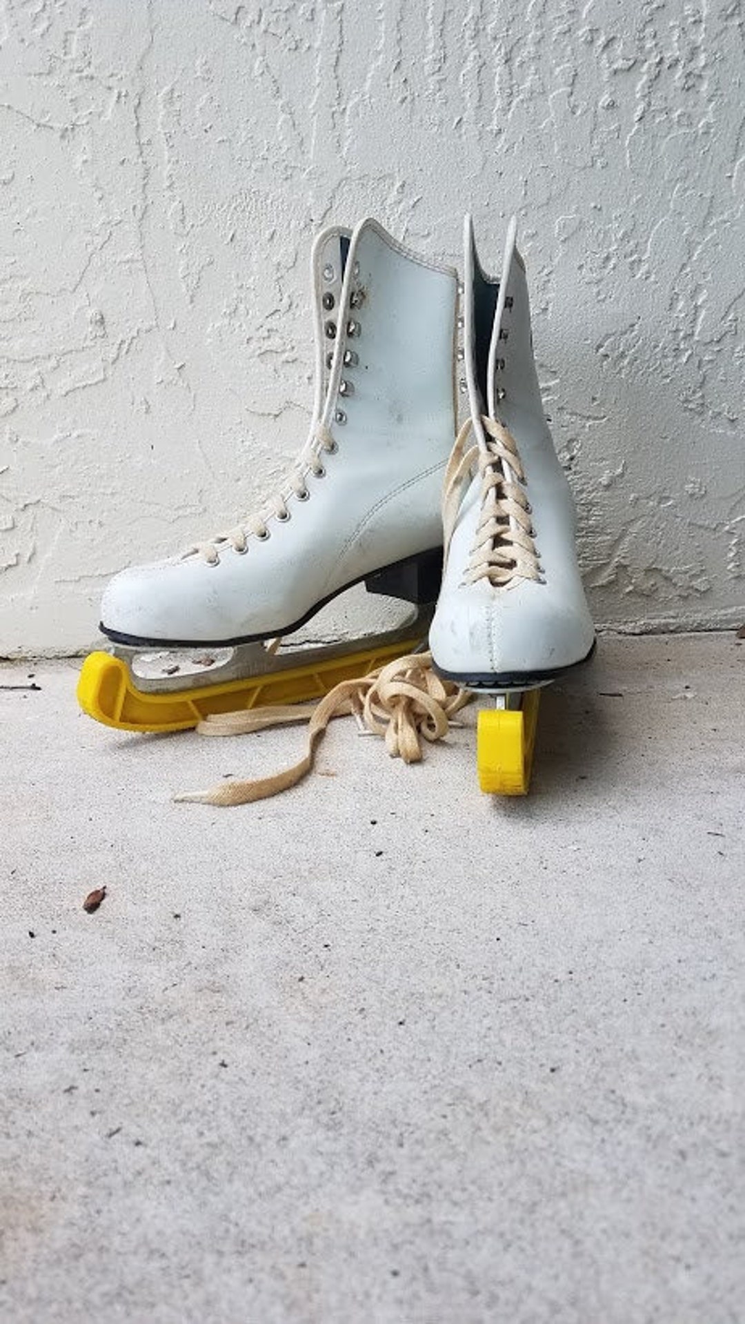 White Ice Skates Ready to Be Used by a Fireplace or on a Sled as a Prop for  Winter 