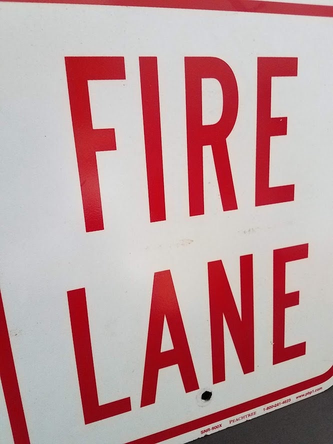 Vintage 'No Parking Fire Lane' Tin Sign - Rustic Distressed Metal Wall Decor, 8x11 Inches, Made In USA 8 thumbnail image