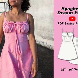 May include: A pink spaghetti strap dress with a gathered bodice and a tie at the neckline. The dress is shown on a model and has a white sewing pattern illustration next to it. The text "Spaghetti Dream Frock" and "PDF Sewing Pattern" are displayed above the illustration. The text "23" - 40" Waist" is displayed below the illustration.