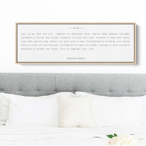 May include: A framed print with a beige background and black text. The text reads: "This is my wish for you: comfort on difficult days, smiles when sadness intrudes, rainbows to follow the clouds, laughter to kiss your lips, sunsets to warm your heart, hugs when spirits sag, beauty for your eyes to see, friendships to brighten your being, faith so that you can believe, confidence for when you doubt, courage to know yourself, patience to accept the truth, love to complete your life. - Ralph Waldo Emerson"
