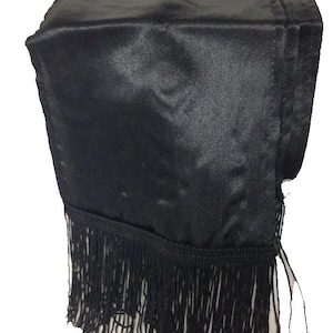 May include: Black satin table runner with a black fringe trim.